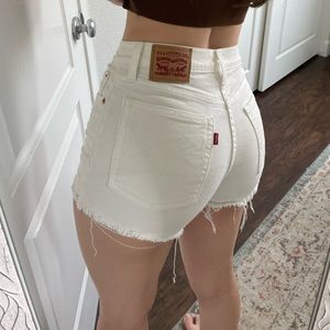 Levi’s High Rise White Fringe Shorts